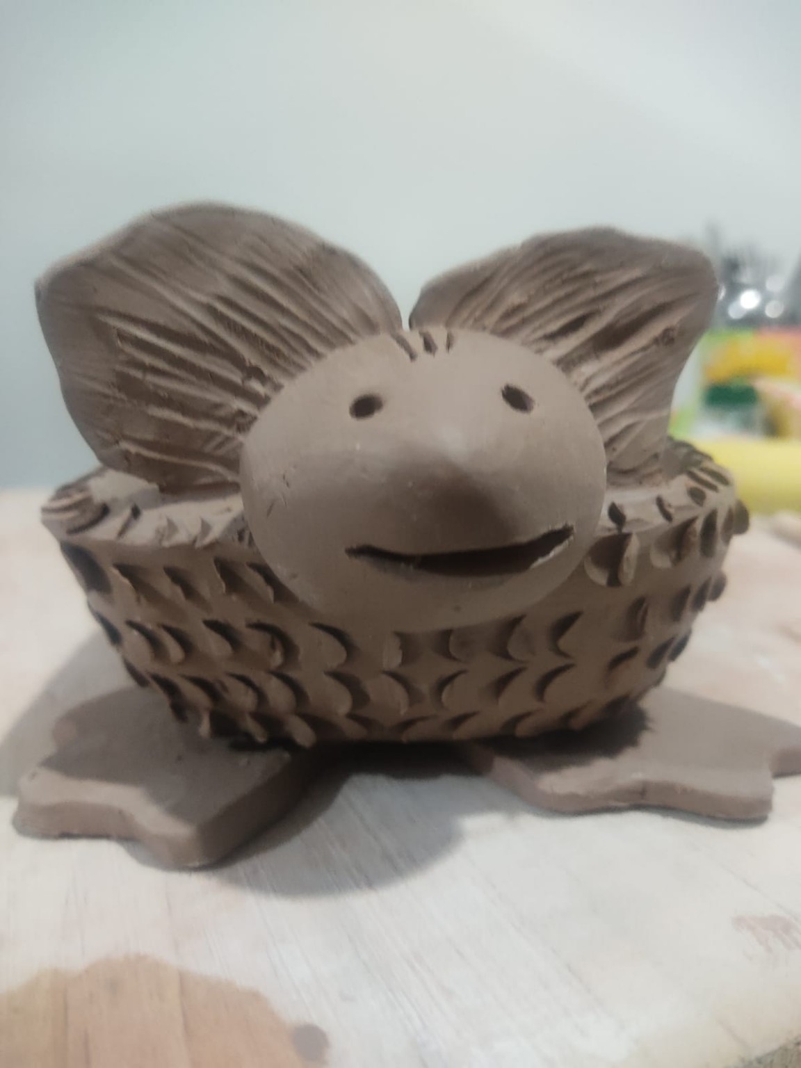 Detalle del ajolote y el sapo